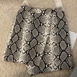 Size XS snakeskin skirt. new with tags!